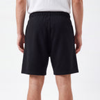 šortky Fear of God Essentials (S25) Shorts Jet Black ADONIO