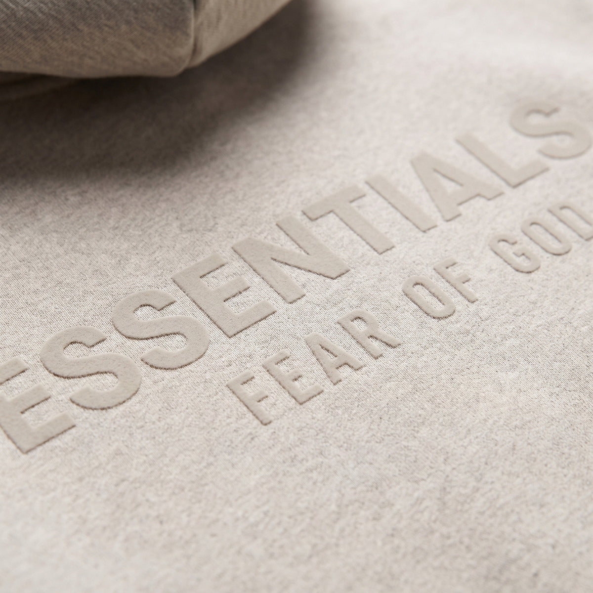 Fear of God Essentials S25 Hoodie Heather Stone ADONIO