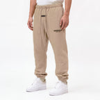 tepláky Fear of God Essentials S24 Fleece Sweatpants Desert Sand 130HO242027F ADONIO